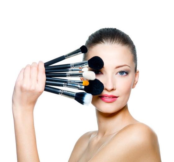 http://www.dreamstime.com/stock-images-portrait-beautiful-woman-make-up-brushes-image17009224